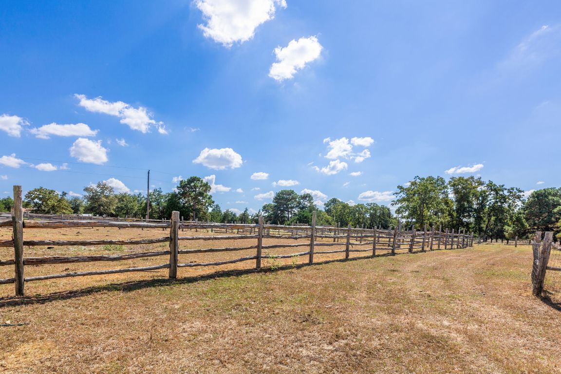 274 Old Potato Road Paige, TX 78659 - Photo 32 of 40 a view of a yard with a outdoor space