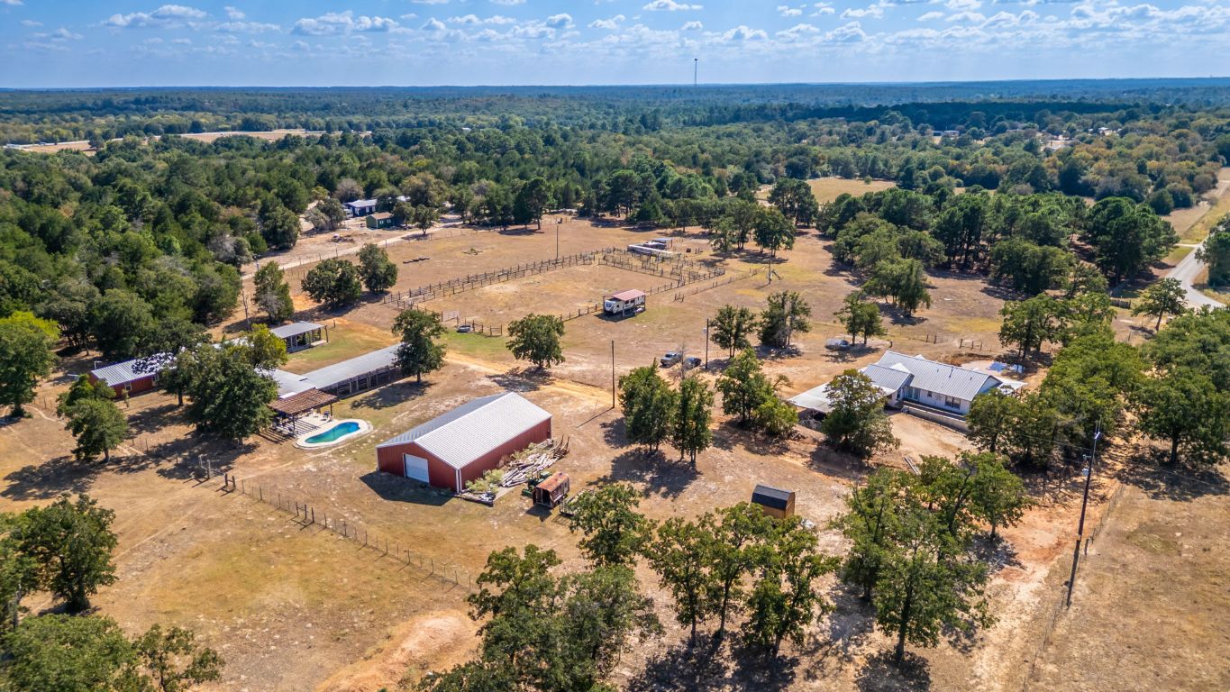 274 Old Potato Road Paige, TX 78659 - Photo 37 of 40 an aerial view of residential houses with outdoor space