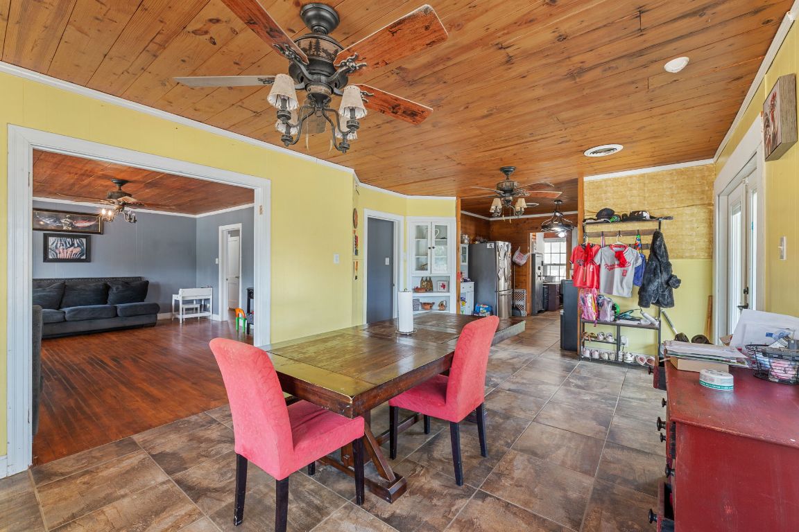 274 Old Potato Road Paige, TX 78659 - Photo 9 of 40 a view of a dining room with furniture