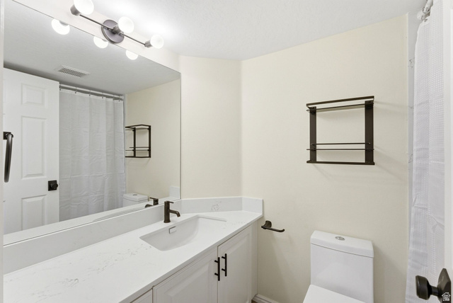1041 West Grindelwald Court, Unit R5 Midway, UT 84049 - Photo 15 of 44 Clean finishes and updated fixtures create a polished, easy-to-maintain bathroom space.