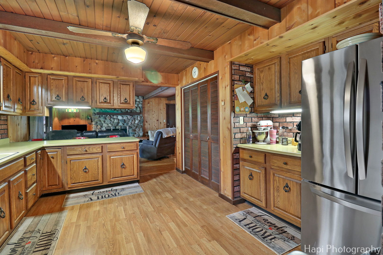 6217 Johnsburg Road Spring Grove, IL 60081 - Photo 7 of 28 a kitchen with stainless steel appliances a refrigerator sink and cabinets