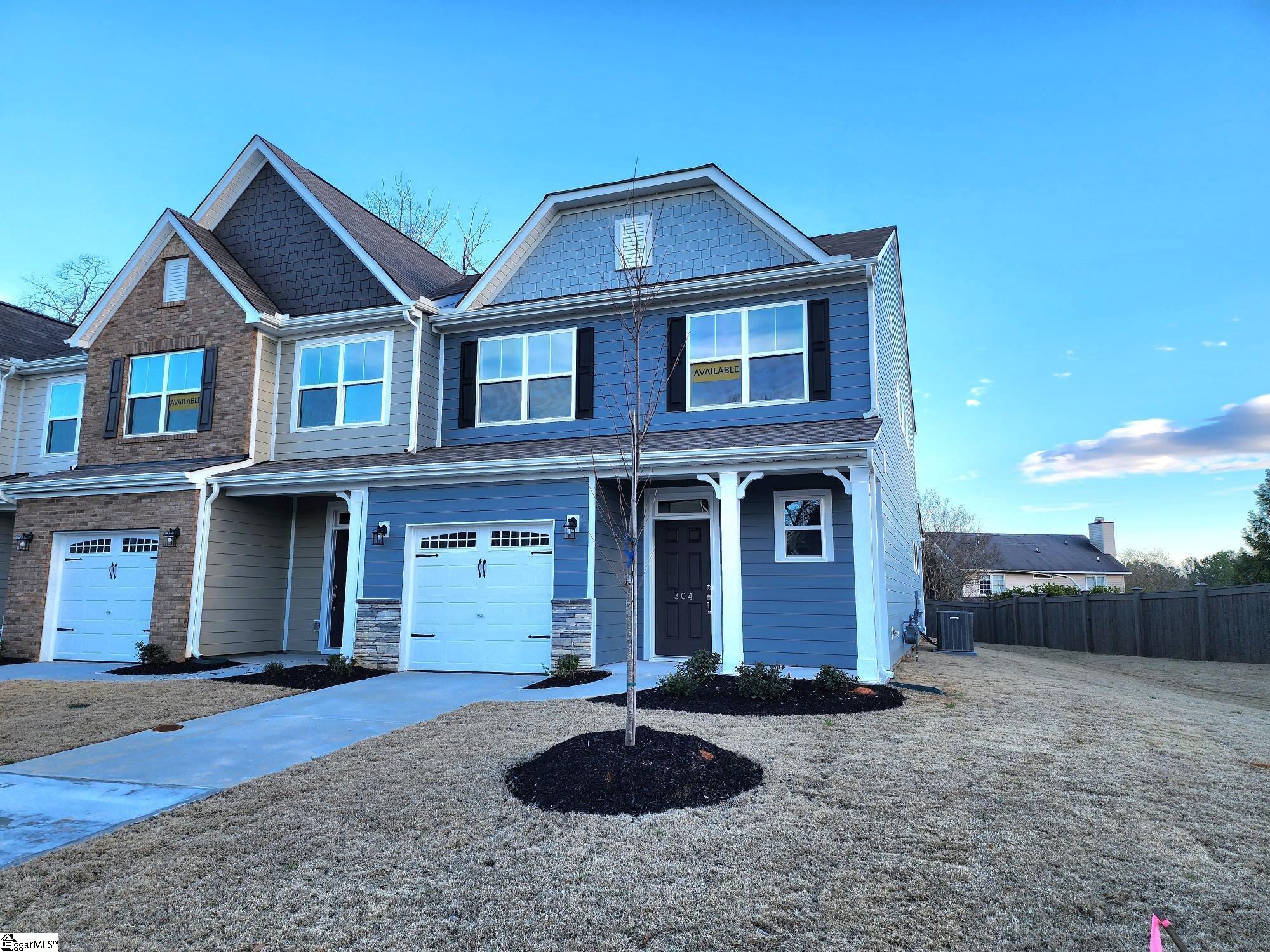 End unit with lovely stone accents.  Additional windows for extra natural light.