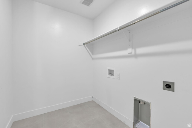 2821 Scarlet Road, Unit 149 Eagle Mountain, UT 84005 - Photo 21 of 28 Dedicated laundry area featuring a light-colored tile floor.