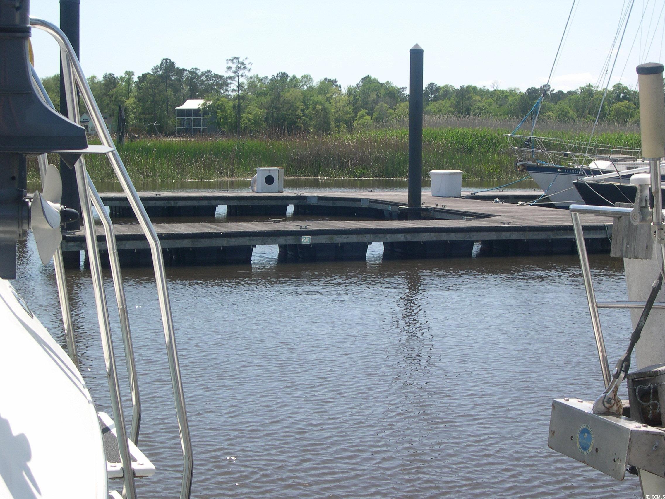 103 Pineberry Drive Georgetown, SC 29440 - Photo 17 of 21 View of dock featuring a water view