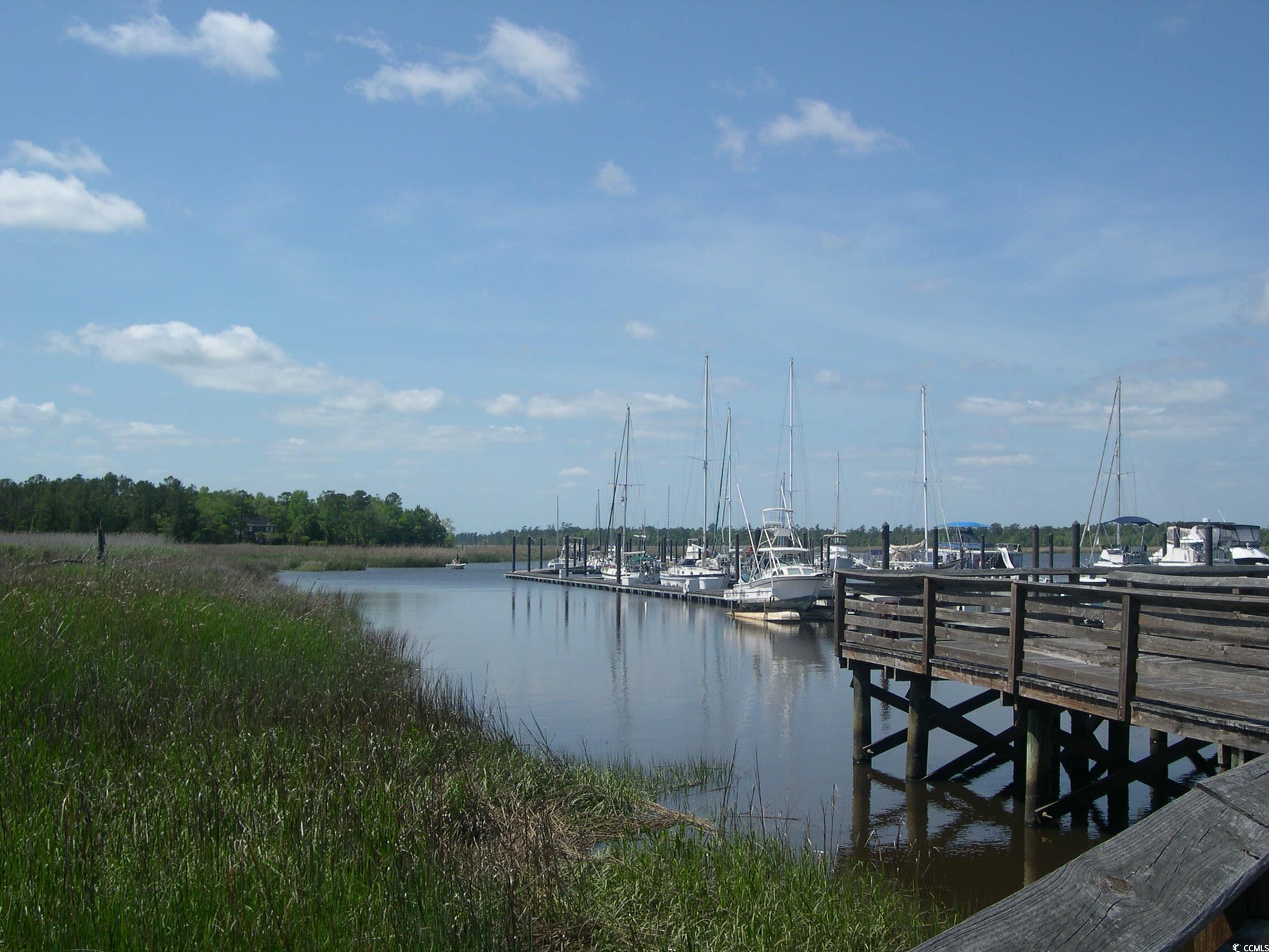 103 Pineberry Drive Georgetown, SC 29440 - Photo 7 of 21 View of dock featuring a water view