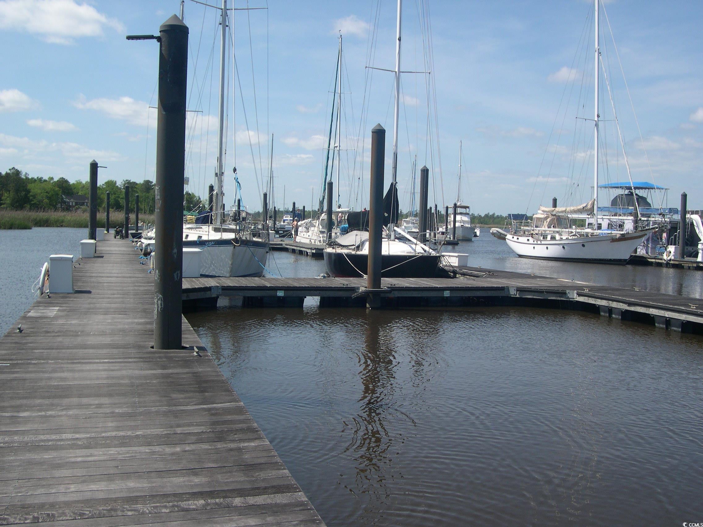 103 Pineberry Drive Georgetown, SC 29440 - Photo 10 of 21 View of dock featuring a water view