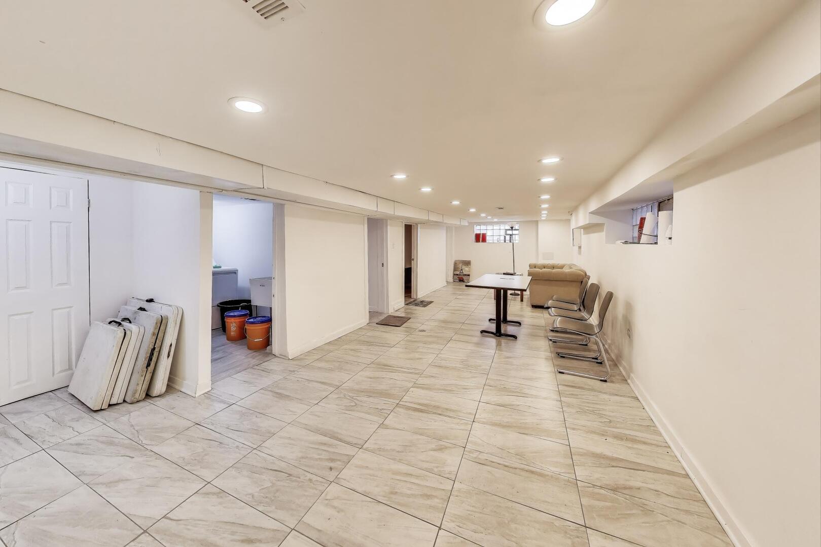 8822 South Ada Street Chicago, IL 60620 - Photo 18 of 25 a view of a room with gym equipment