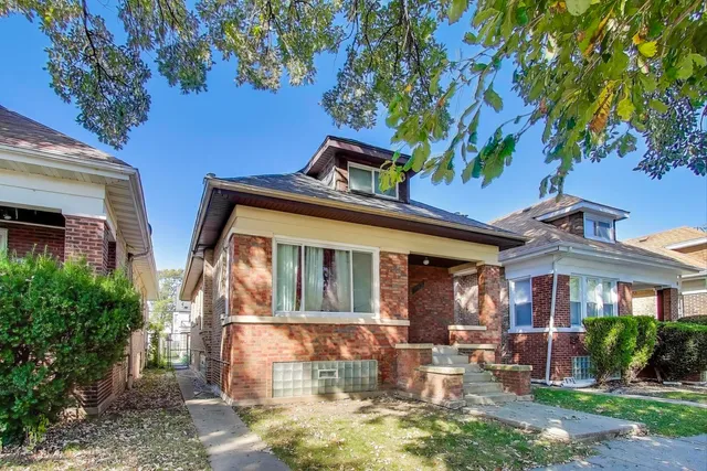 a front view of house with a yard