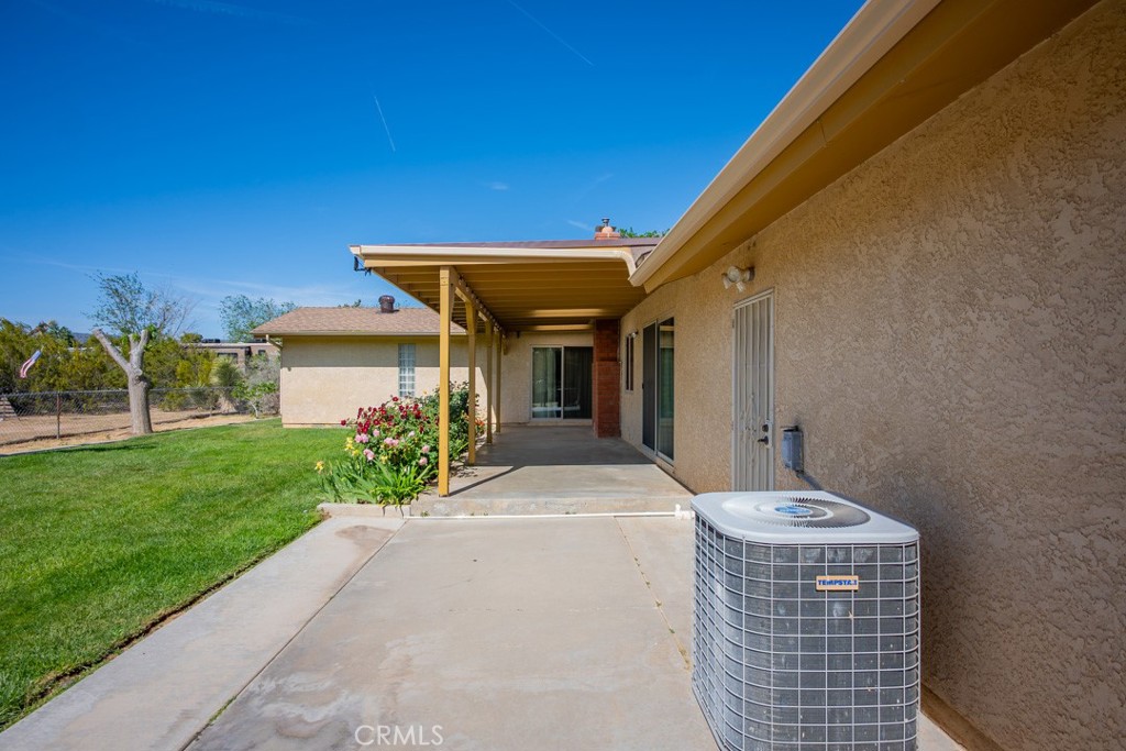 4628 West Ave K8 Quartz Hill, CA 93536 - Photo 28 of 57 a front view of a house with a yard