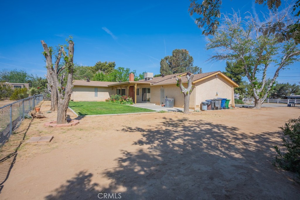 4628 West Ave K8 Quartz Hill, CA 93536 - Photo 31 of 57 a view of a house with a yard