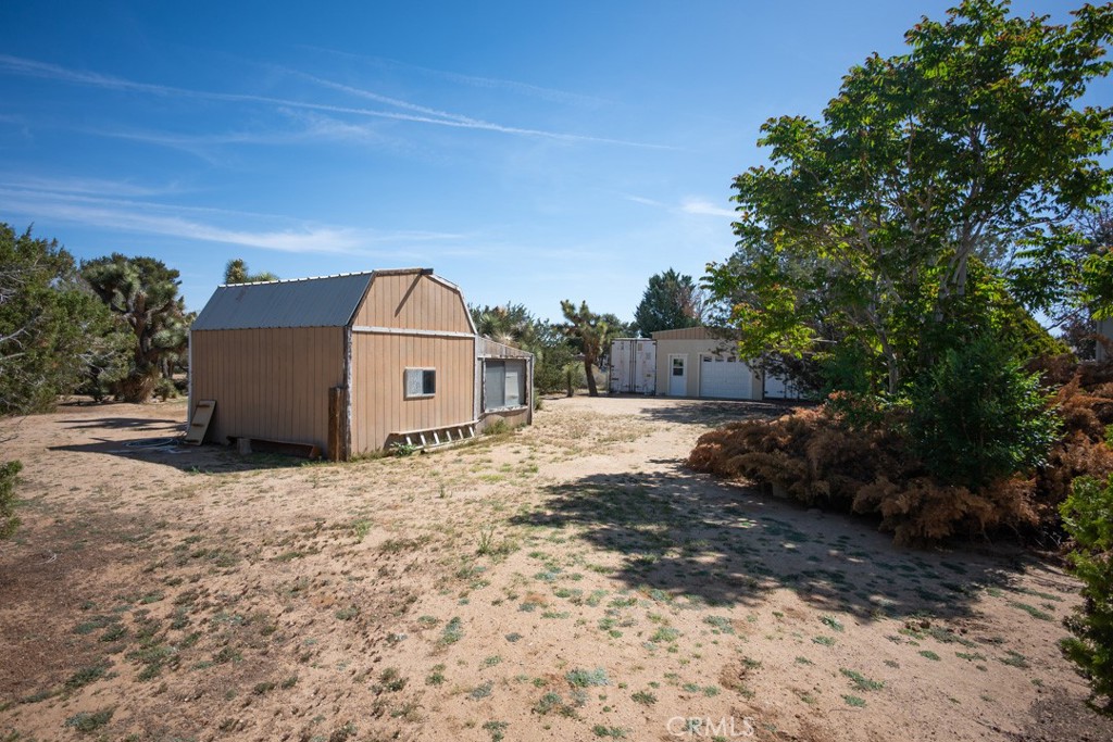 4628 West Ave K8 Quartz Hill, CA 93536 - Photo 37 of 57 a view of a house with a yard