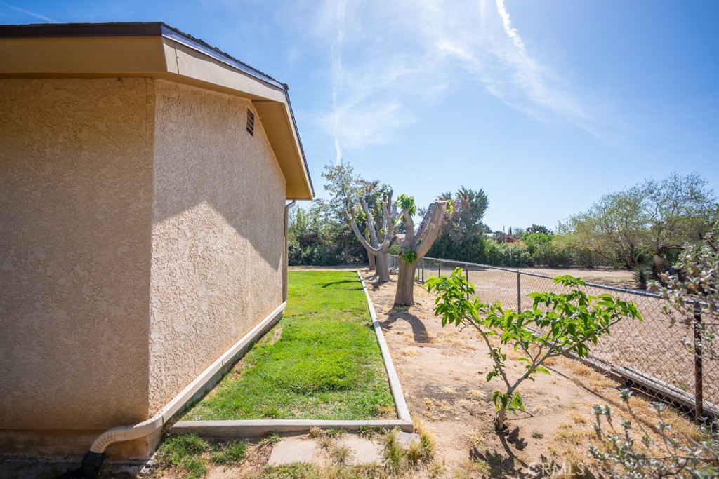 4628 West Ave K8 Quartz Hill, CA 93536 - Photo 47 of 57 a view of a back yard of the house