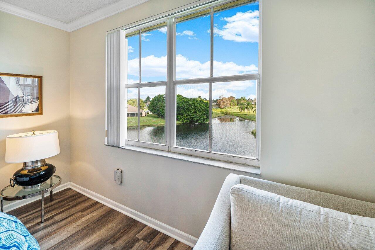 2040 Greenview Shores Boulevard, Unit 223 Wellington, FL 33414 - Photo 15 of 15 a room with window