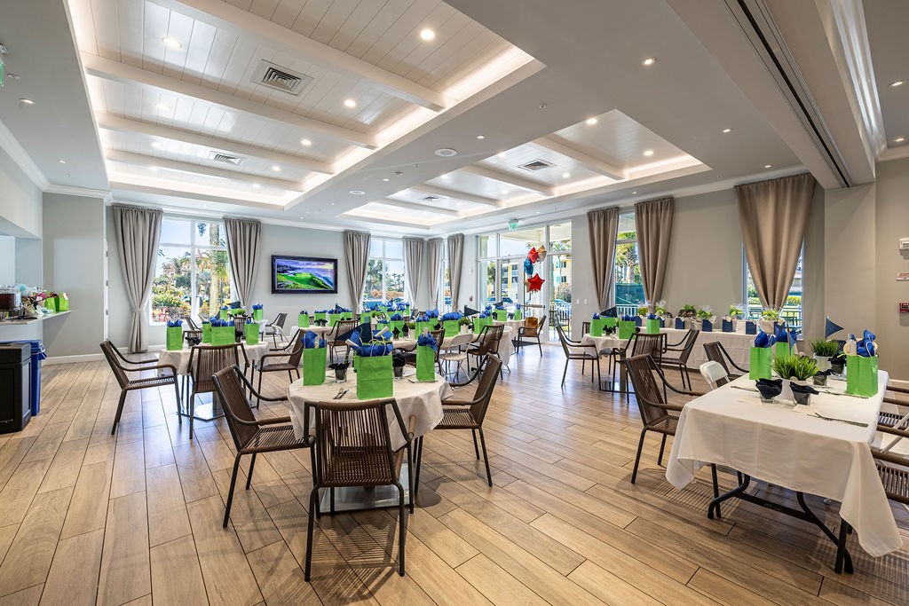 2400 South Ocean Drive, Unit 913 Fort Pierce, FL 34949 - Photo 25 of 36 a view of a dining room with furniture window and wooden floor