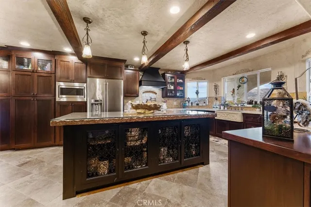a living room with fireplace furniture and a flat screen tv