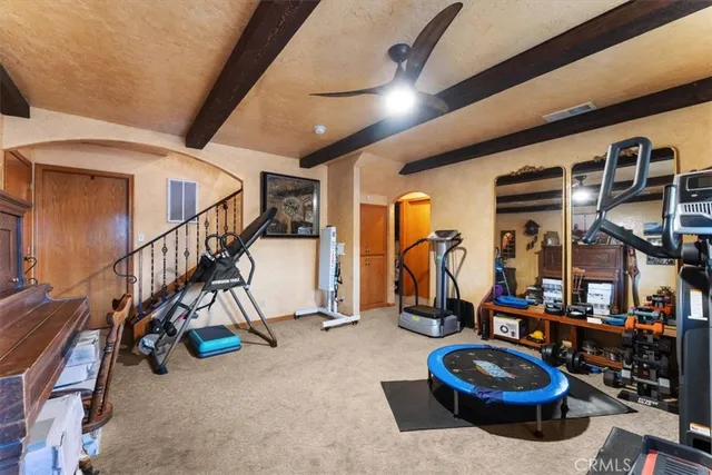 a view of a workspace with furniture