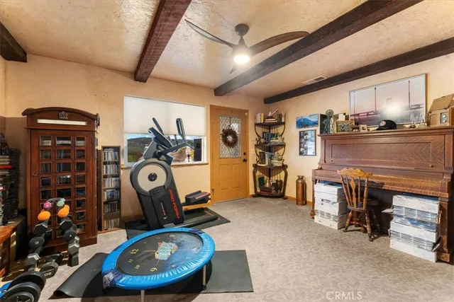 a view of a building with fountain in front of it