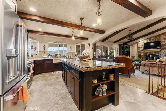 a kitchen with a sink and a stove