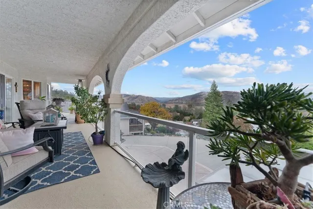 an aerial view of a house with a mountain view
