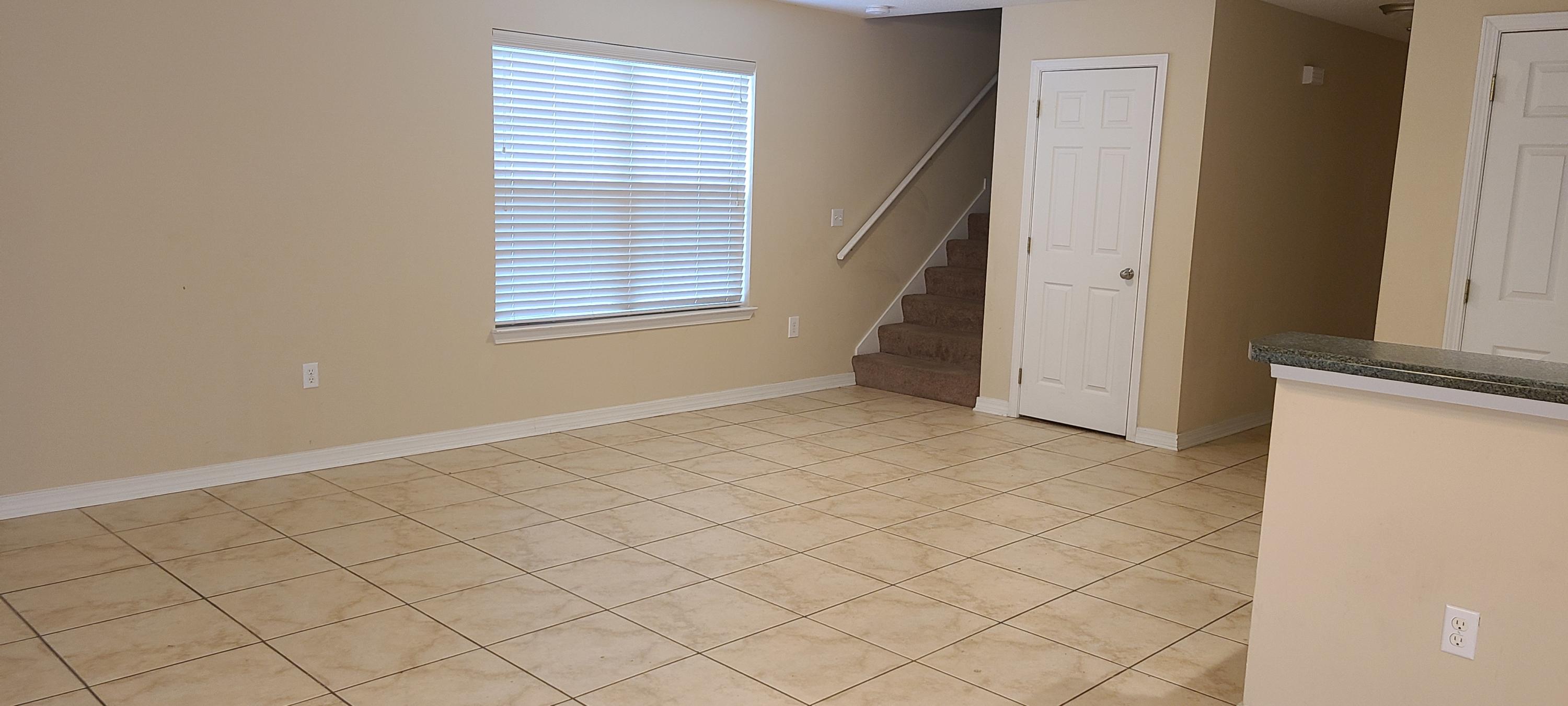 291 Dahlquist Drive Crestview, FL 32539 - Photo 14 of 25 an empty room with windows