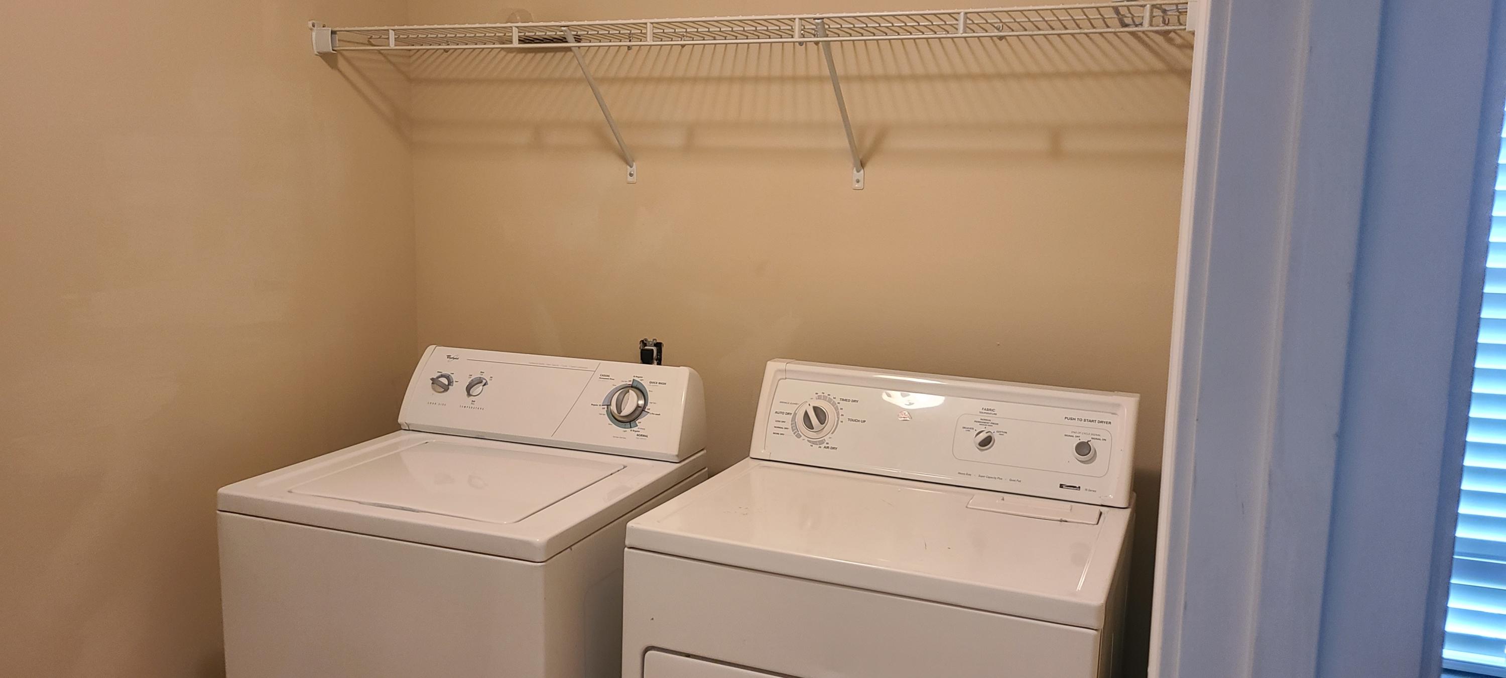 291 Dahlquist Drive Crestview, FL 32539 - Photo 15 of 25 a utility room with dryer and washer