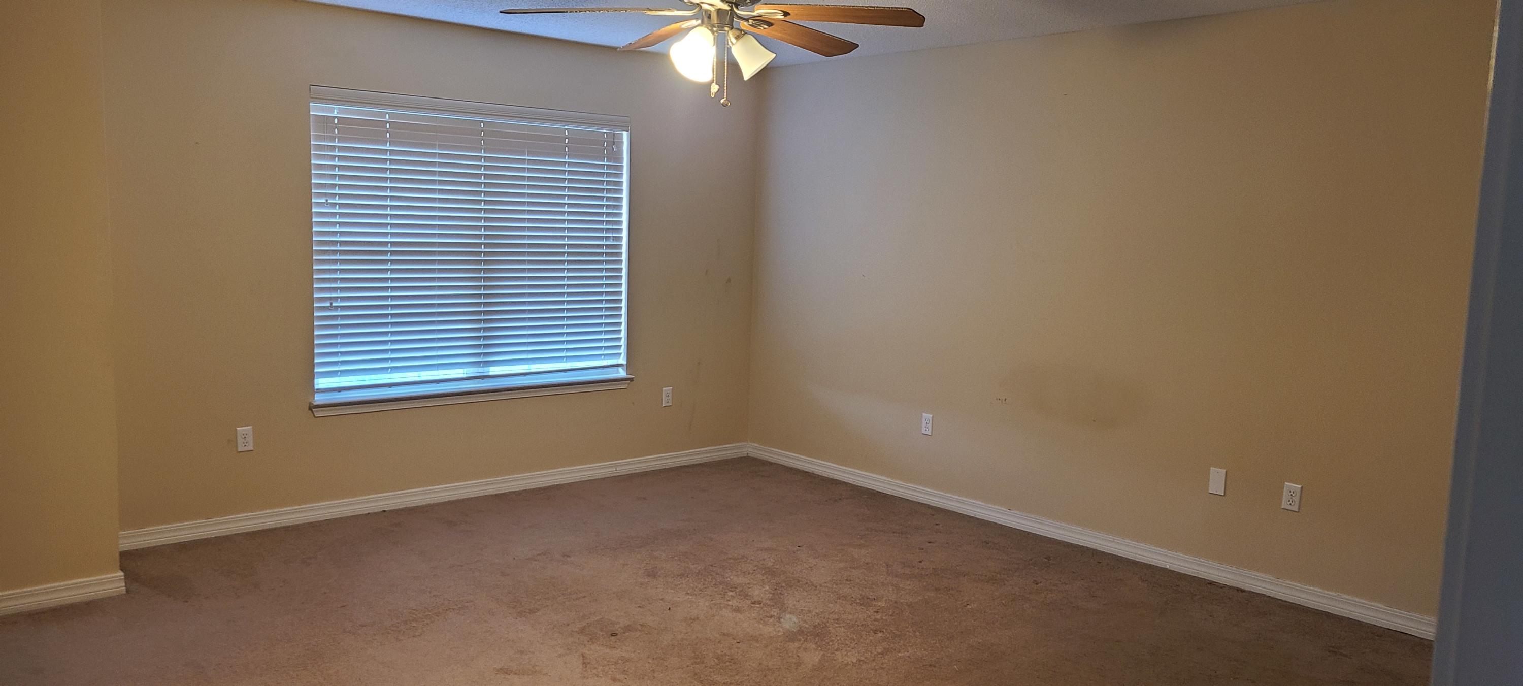 291 Dahlquist Drive Crestview, FL 32539 - Photo 16 of 25 an empty room with a window