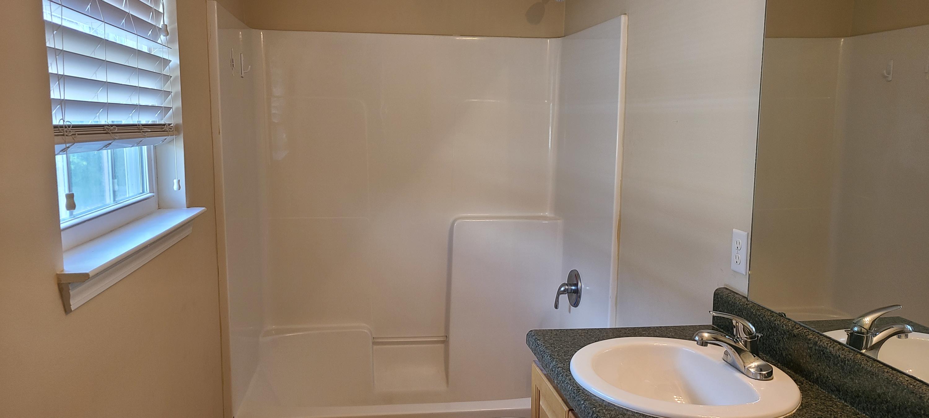 291 Dahlquist Drive Crestview, FL 32539 - Photo 20 of 25 a bathroom with a sink and a mirror