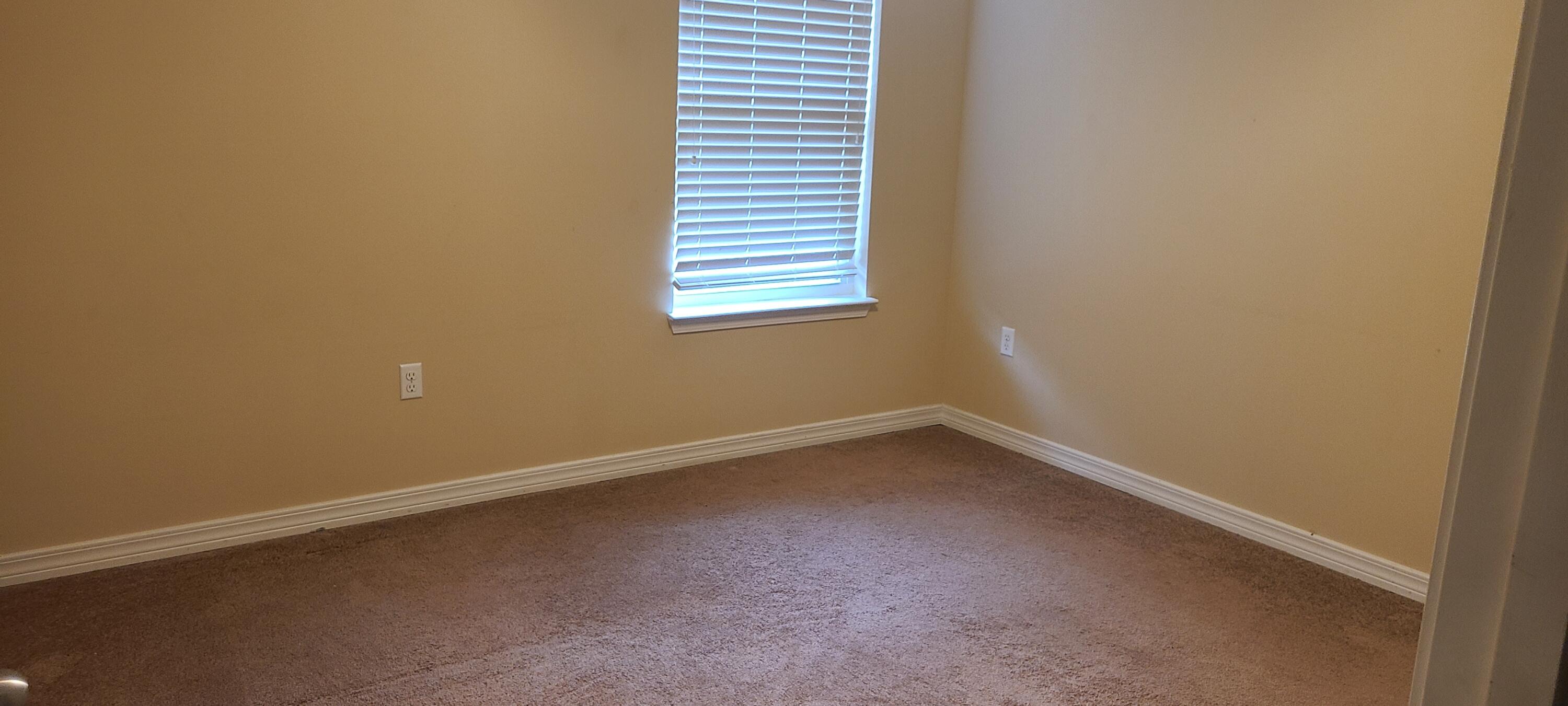 291 Dahlquist Drive Crestview, FL 32539 - Photo 23 of 25 an empty room with a window
