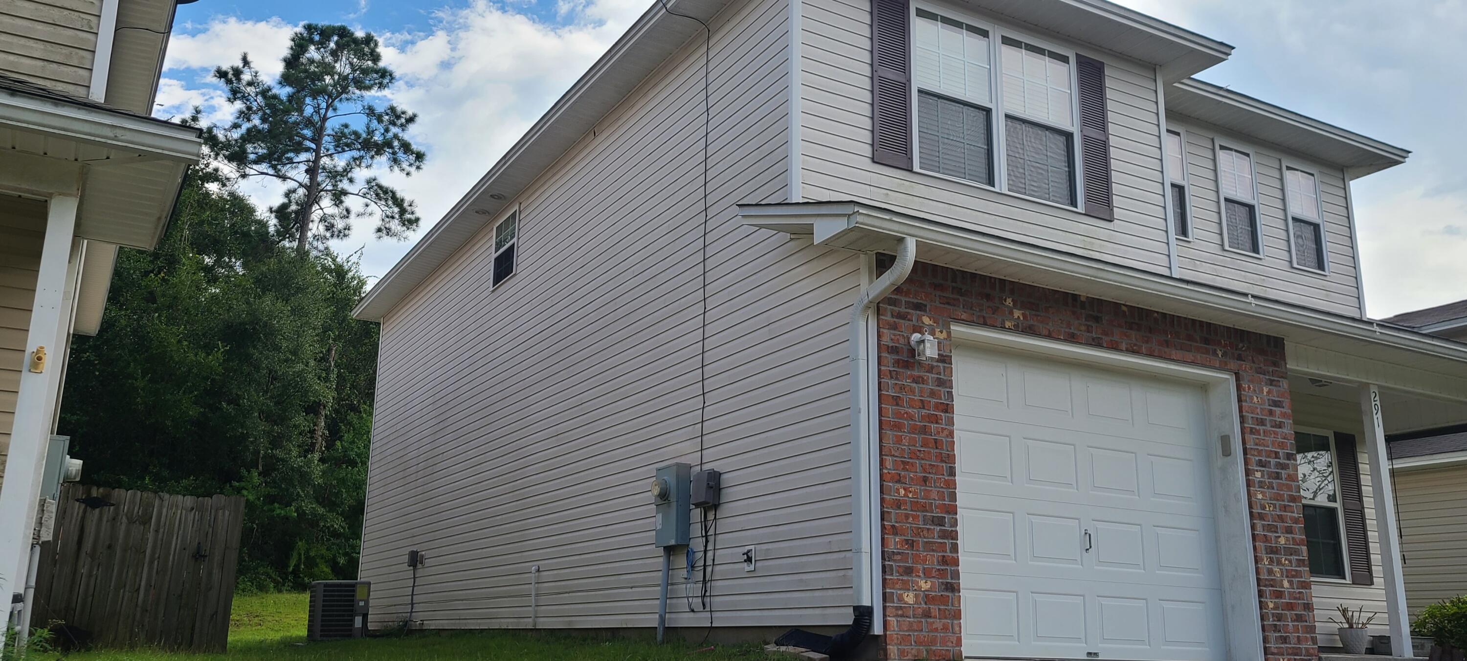 291 Dahlquist Drive Crestview, FL 32539 - Photo 4 of 25 a view of a house with a tree