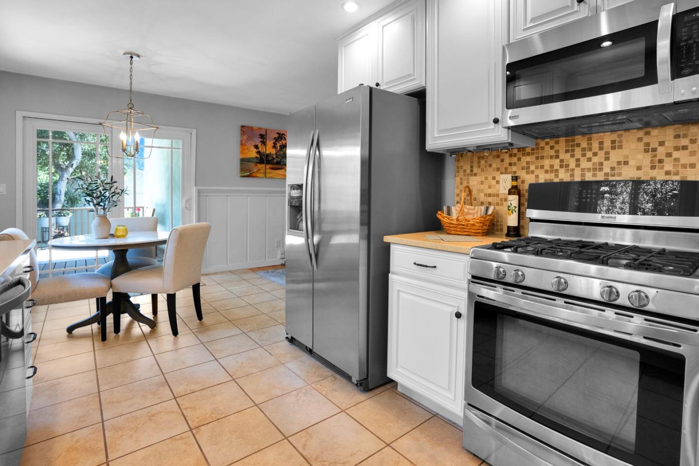 455 San Bernabe Drive Monterey, CA 93940 - Photo 13 of 32 a kitchen with stainless steel appliances granite countertop a refrigerator and a stove top oven