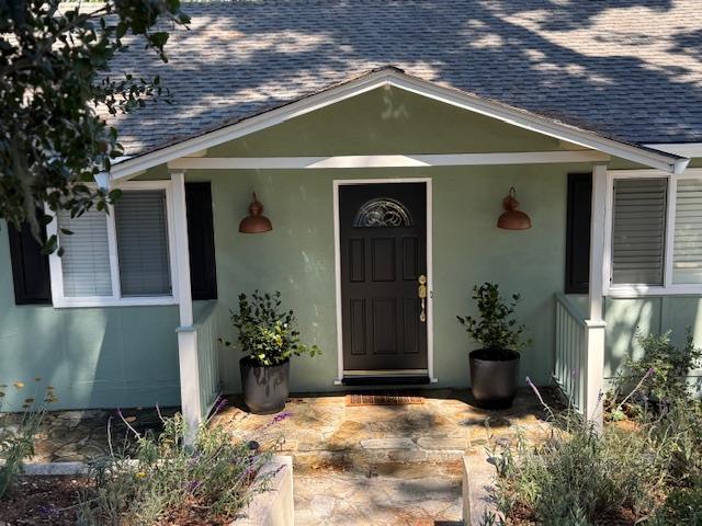455 San Bernabe Drive Monterey, CA 93940 - Photo 2 of 32 a front view of a house with plants