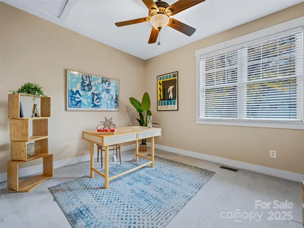 a room with furniture and window