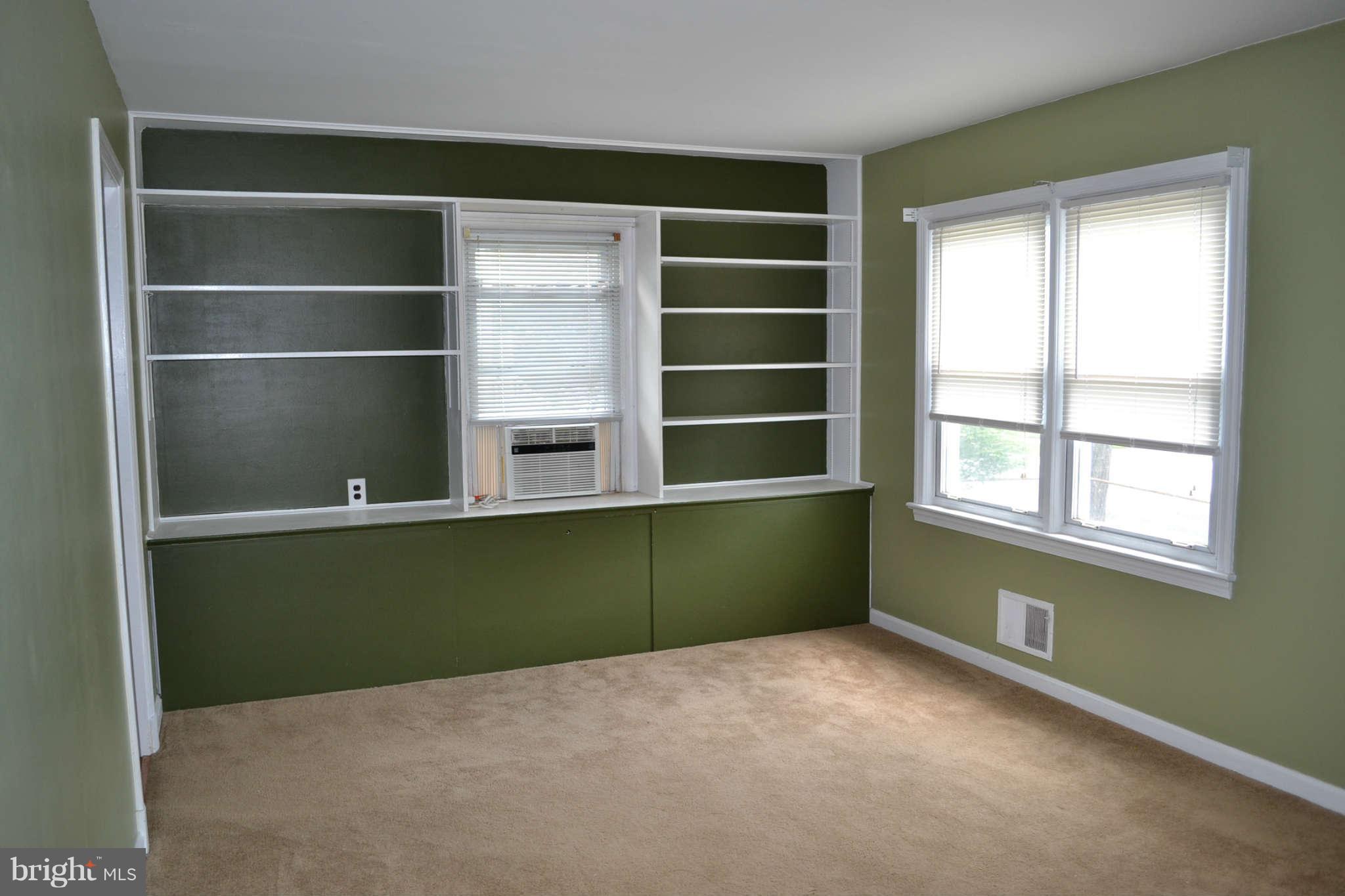 1612 Moffet Road Silver Spring, MD 20903 - Photo 5 of 24 Built in bookshelves and storage underneath
