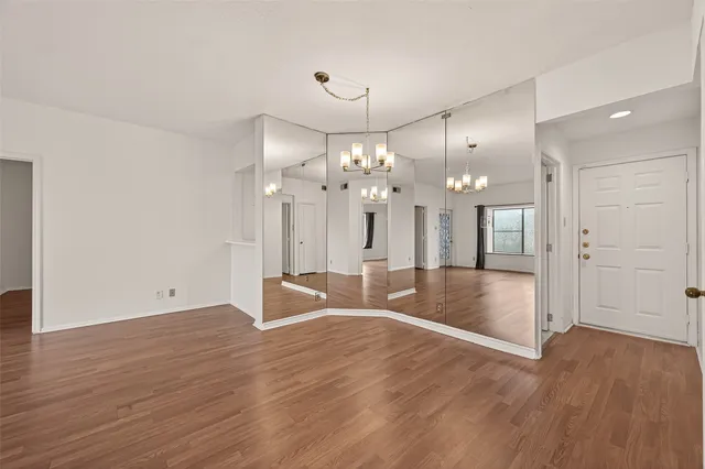 a view of a livingroom with wooden floor