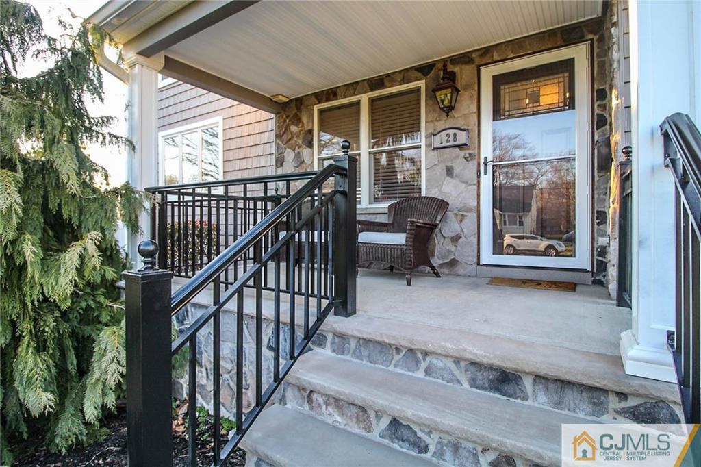 128 Morningside Road Colonia, NJ 07067 - Photo 3 of 25 a view of balcony with furniture and wooden deck