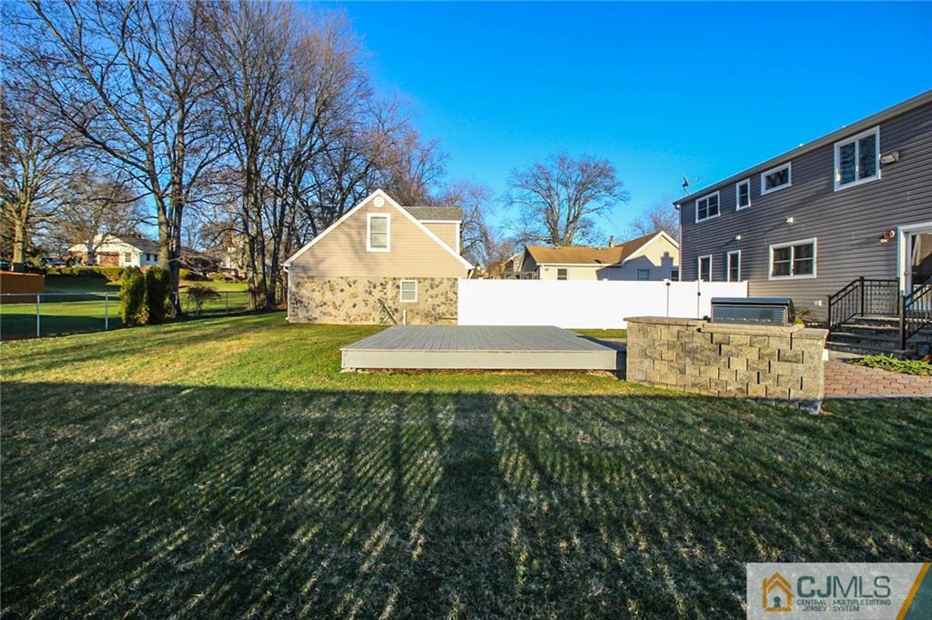 128 Morningside Road Colonia, NJ 07067 - Photo 25 of 25 a view of a house with a yard
