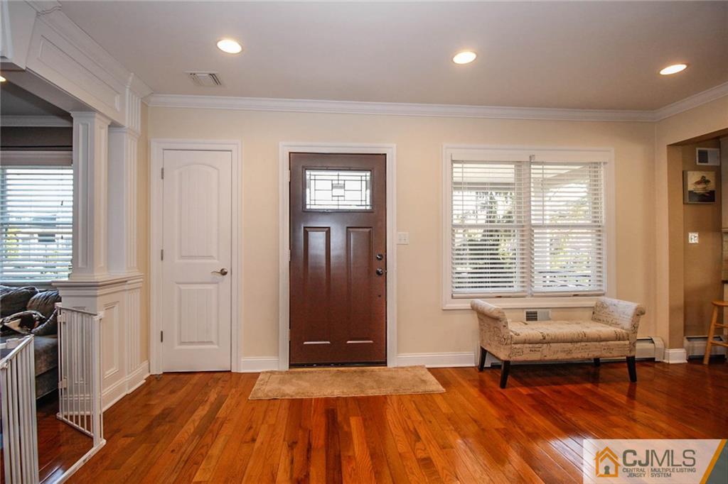 128 Morningside Road Colonia, NJ 07067 - Photo 6 of 25 a bedroom with a bed and a window
