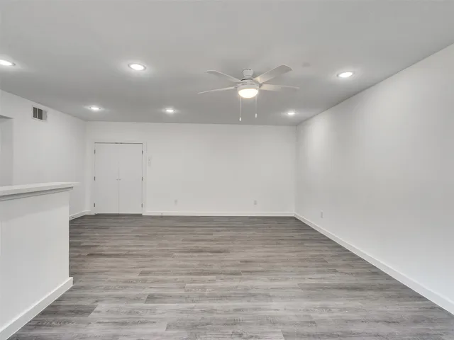a bathroom with 2 sink tub and a mirror