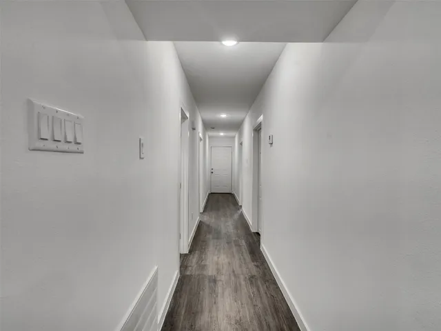 a bathroom with a toilet and a bathtub