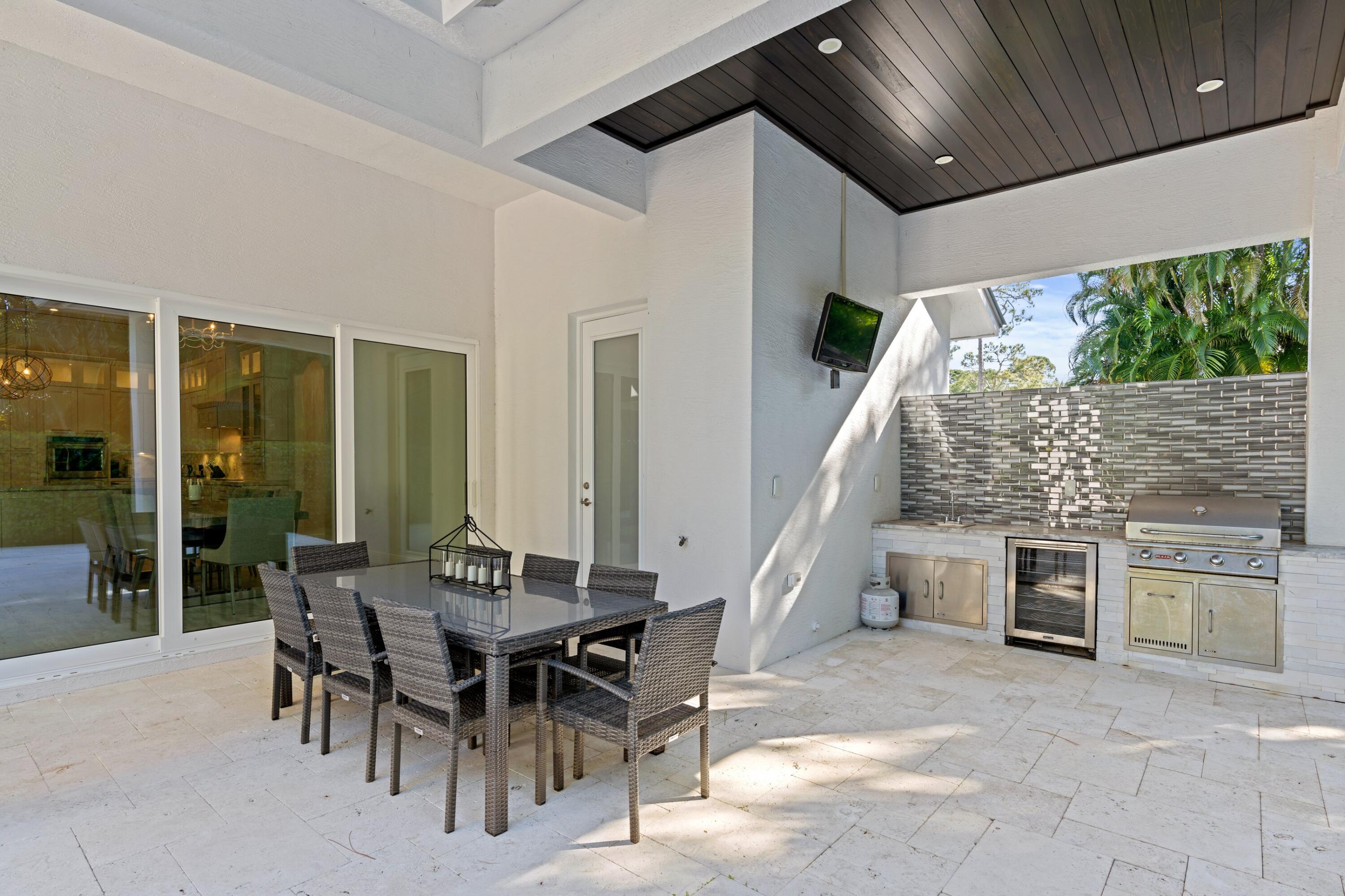 5502 Hibiscus Road Jupiter, FL 33458 - Photo 14 of 15 Summer Kitchen