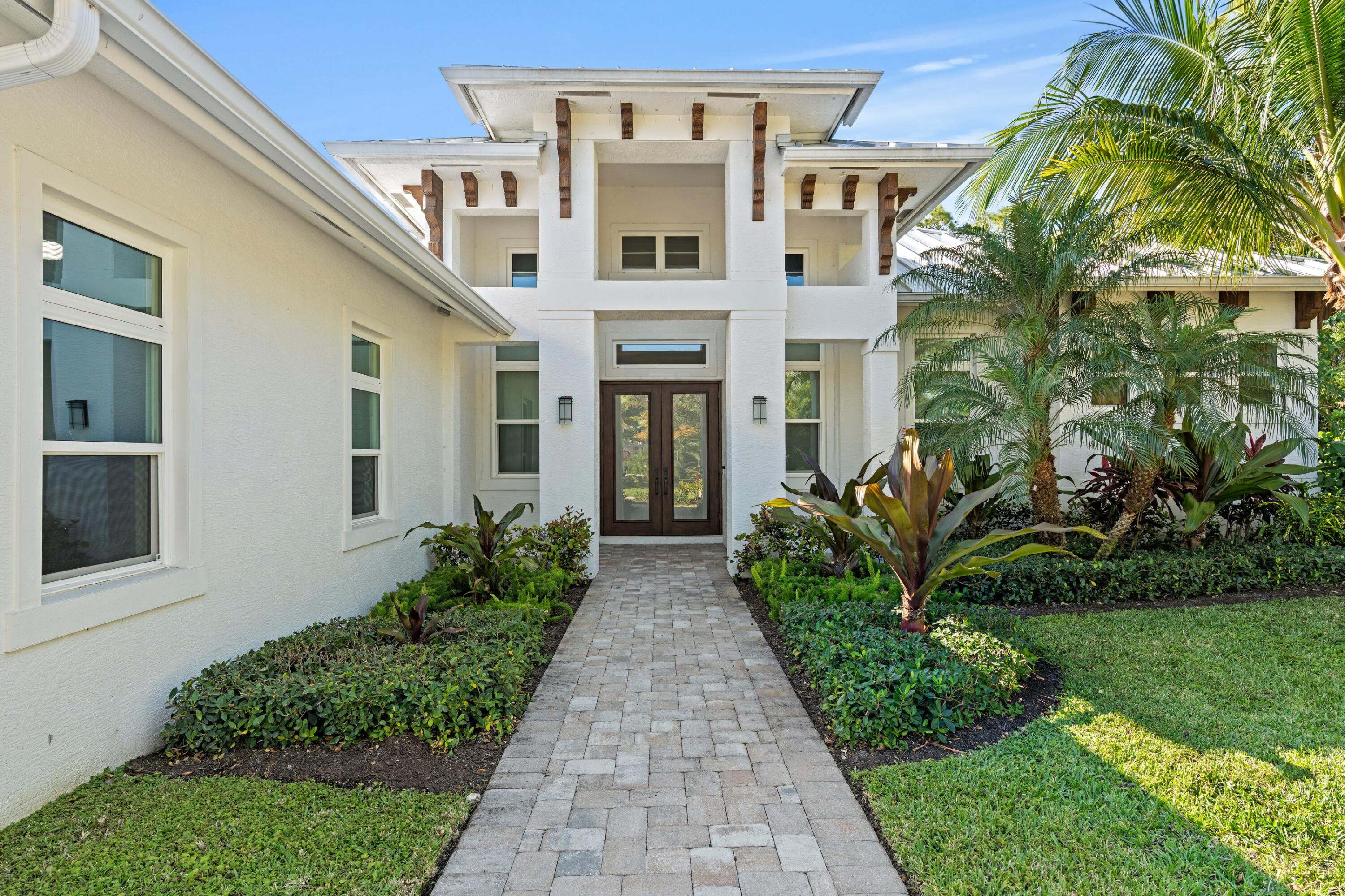 5502 Hibiscus Road Jupiter, FL 33458 - Photo 2 of 15 Front Entry