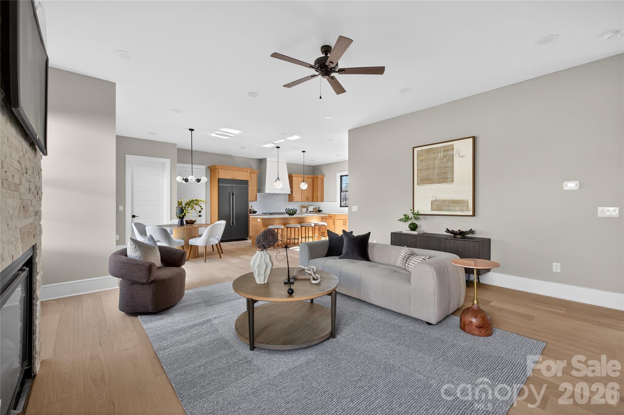 6811 Burlwood Road Charlotte, NC 28211 - Photo 14 of 43 a living room with furniture and a flat screen tv