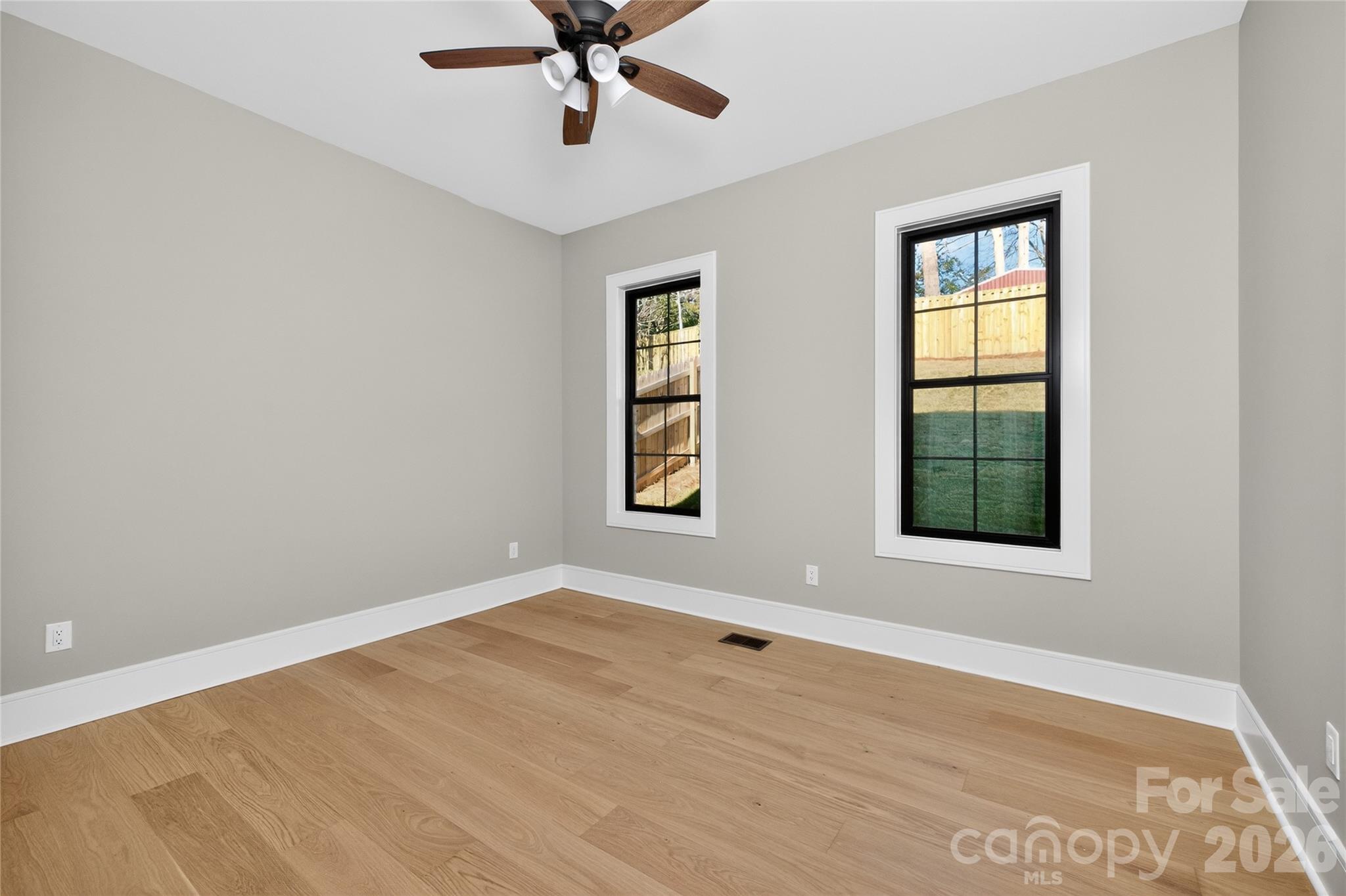 6811 Burlwood Road Charlotte, NC 28211 - Photo 19 of 43 a view of an empty room with a window