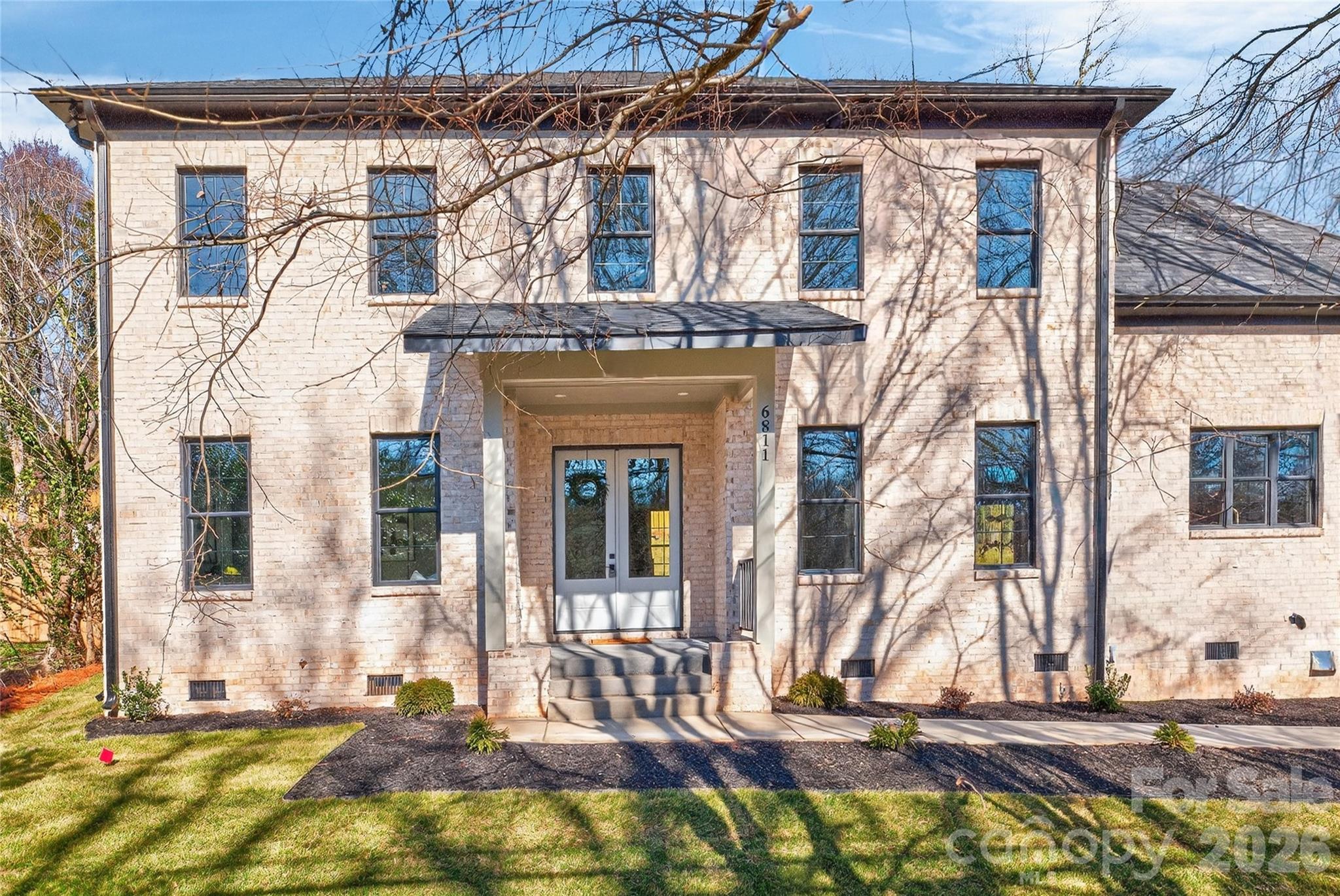 6811 Burlwood Road Charlotte, NC 28211 - Photo 2 of 43 a view of a house with a large windows
