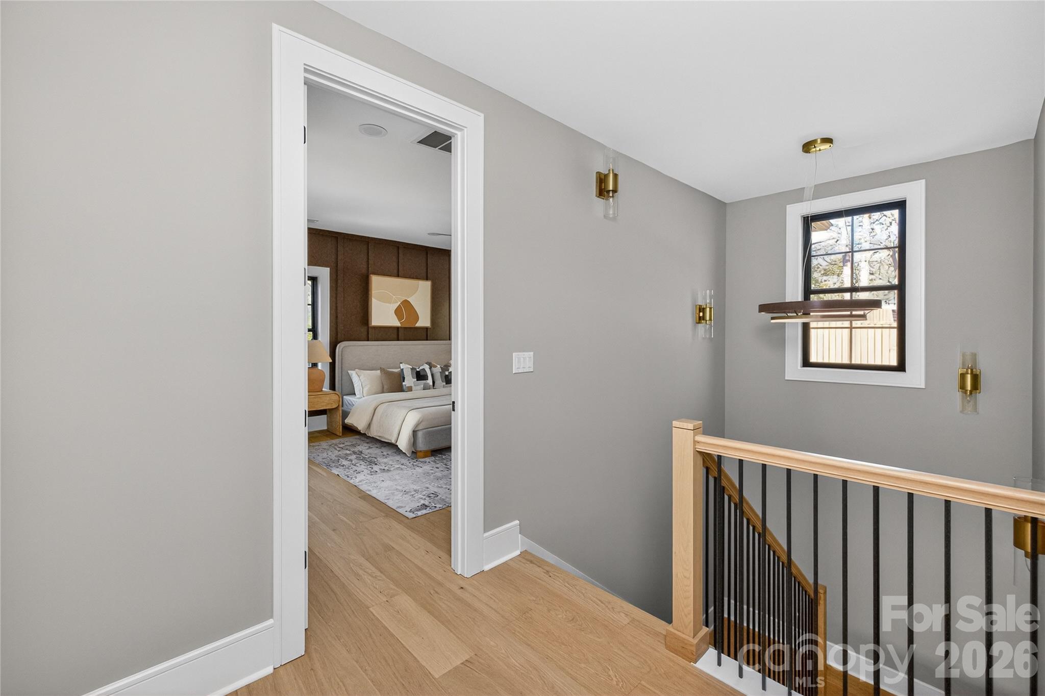 6811 Burlwood Road Charlotte, NC 28211 - Photo 22 of 43 a view of a bedroom from a hallway