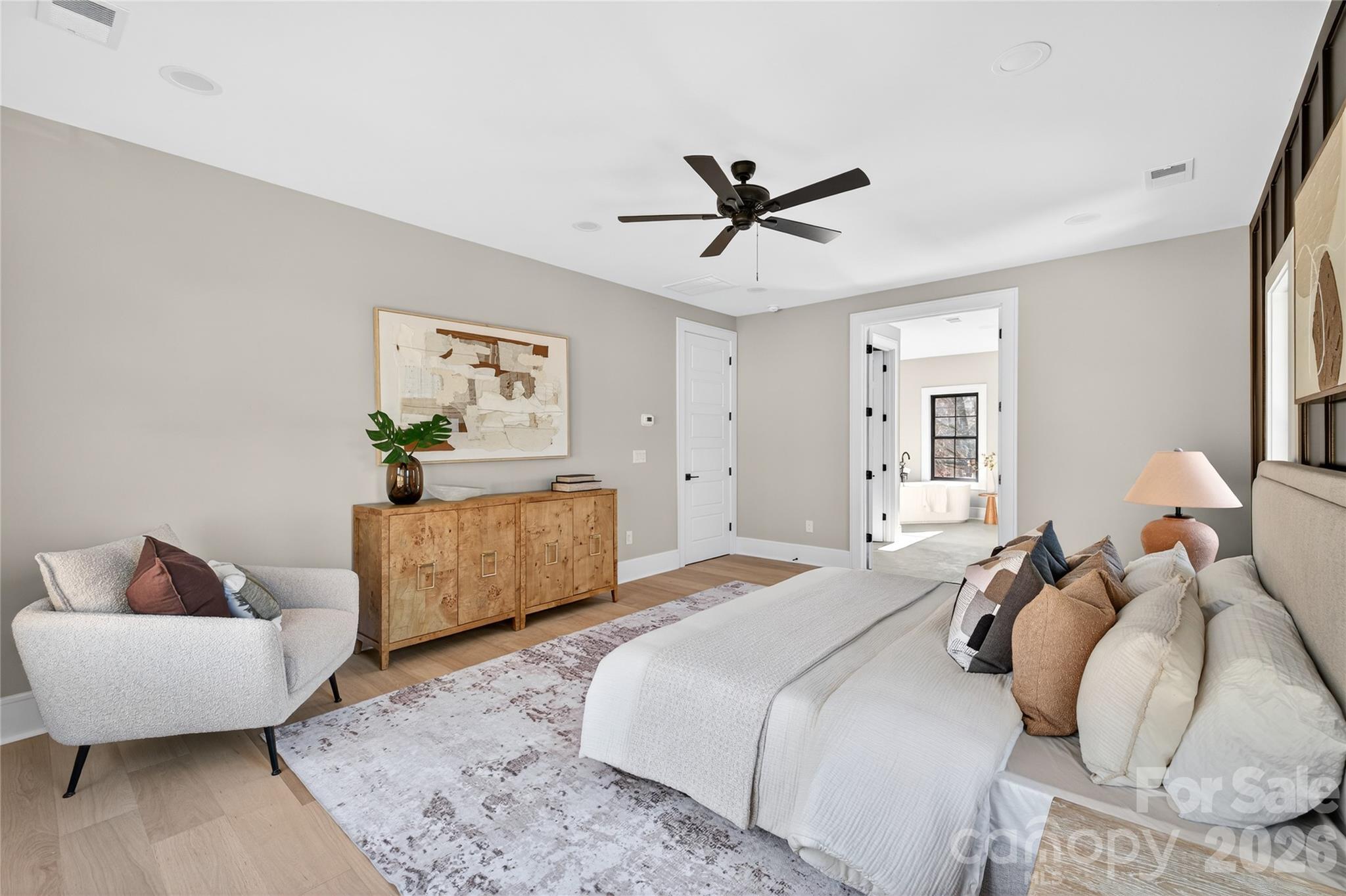 6811 Burlwood Road Charlotte, NC 28211 - Photo 24 of 43 a bedroom with a bed and a couch