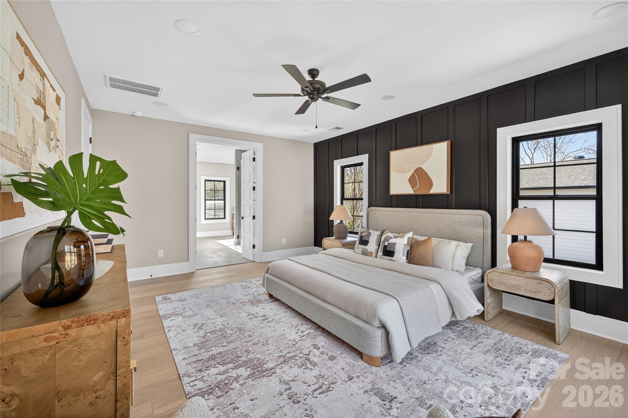 6811 Burlwood Road Charlotte, NC 28211 - Photo 25 of 43 a bedroom with a bed potted plant with the window