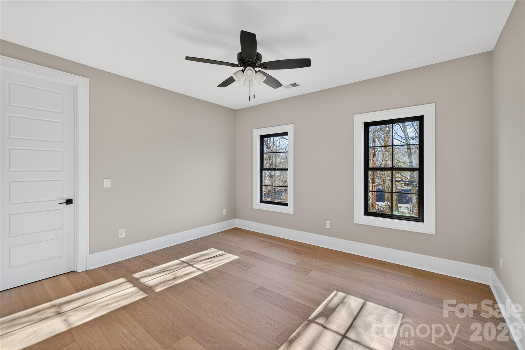 6811 Burlwood Road Charlotte, NC 28211 - Photo 29 of 43 a view of an empty room with a window