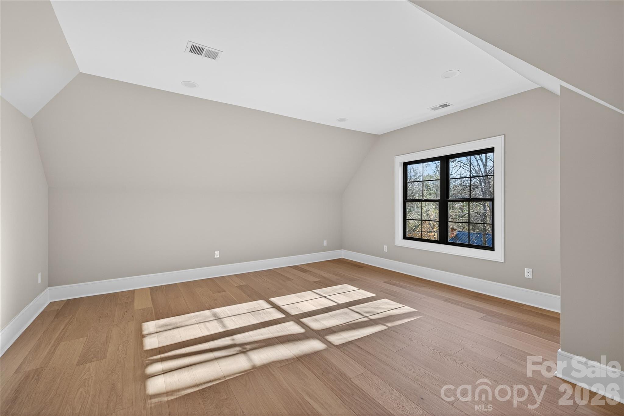 6811 Burlwood Road Charlotte, NC 28211 - Photo 33 of 43 an empty room with windows