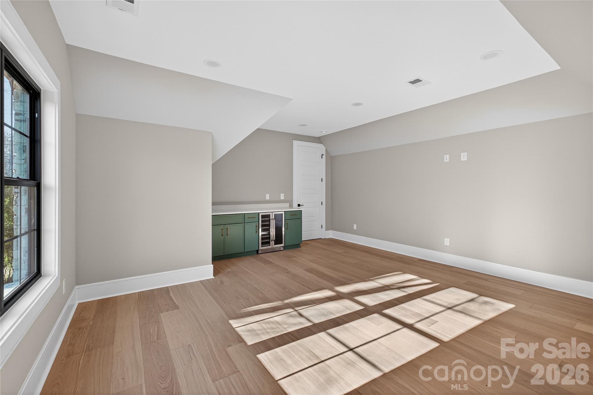 6811 Burlwood Road Charlotte, NC 28211 - Photo 34 of 43 a view of a kitchen with wooden floor and a sink